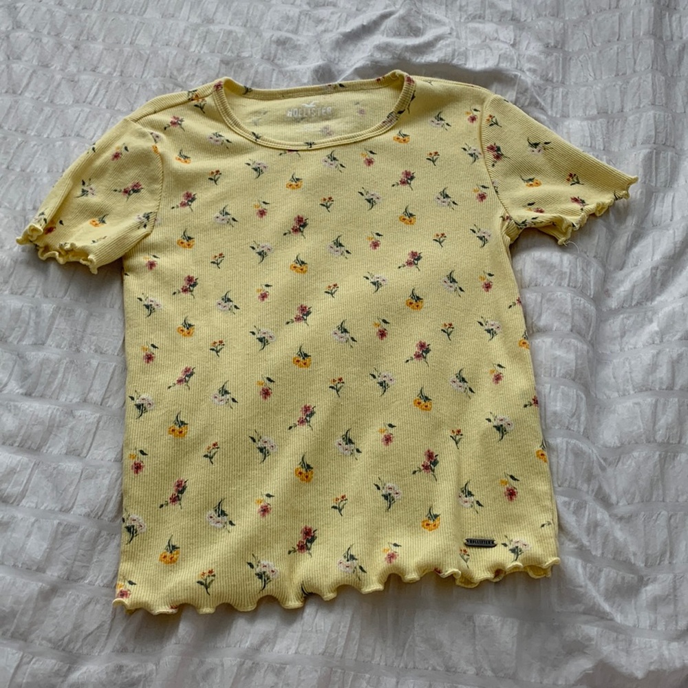Yellow with flowers over it size xxs never worn